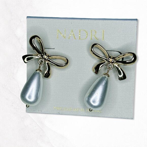 Nadri Jewelry - 7217. Goldtone Bow Earrings Nadri